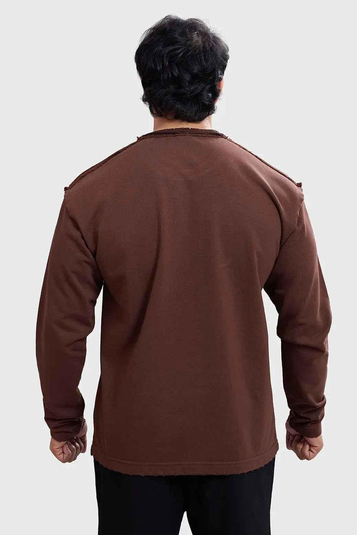 Brown Shell Raw Sweatshirt by Fuaark Nz, featuring a cozy, relaxed fit with a soft fabric texture for comfortable casual wear.
