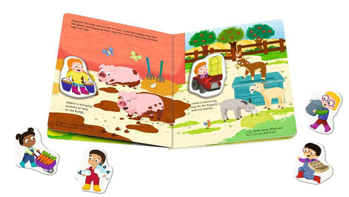 Open magnetic farm book with colorful illustrations of pigs and goats plus five loose child character magnets.