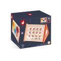Janod blue box showing a triangular wooden toy with multiple small round mirrors and three large colored mirrors.