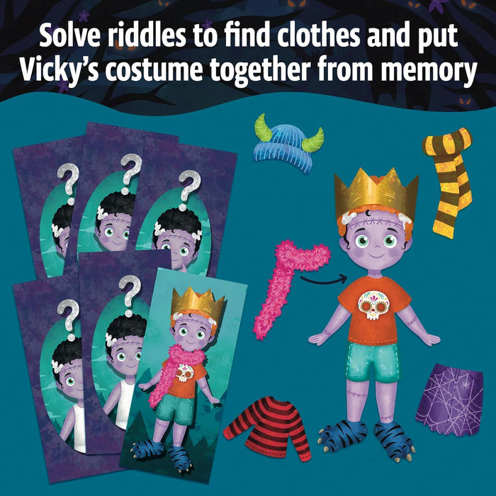 Vicky the purple monster surrounded by costume accessories like a gold crown, pink boa, and striped sweater.