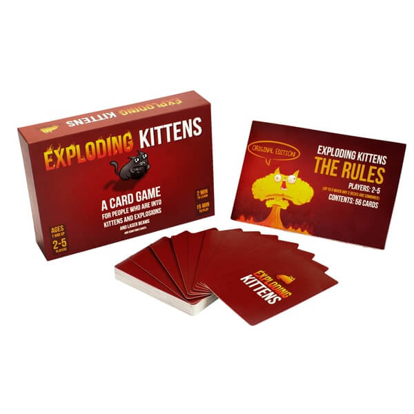 Red card game box with a black cat, fanned playing cards, and a rulebook with a cat-shaped mushroom cloud.