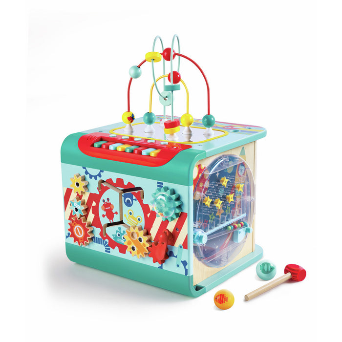 Mint green activity cube featuring a wire bead maze, piano keys, gears, and pinball side with mallet and colorful balls.