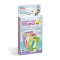 Light blue box of feelings cards featuring colorful emojis and illustrations of children expressing various emotions.