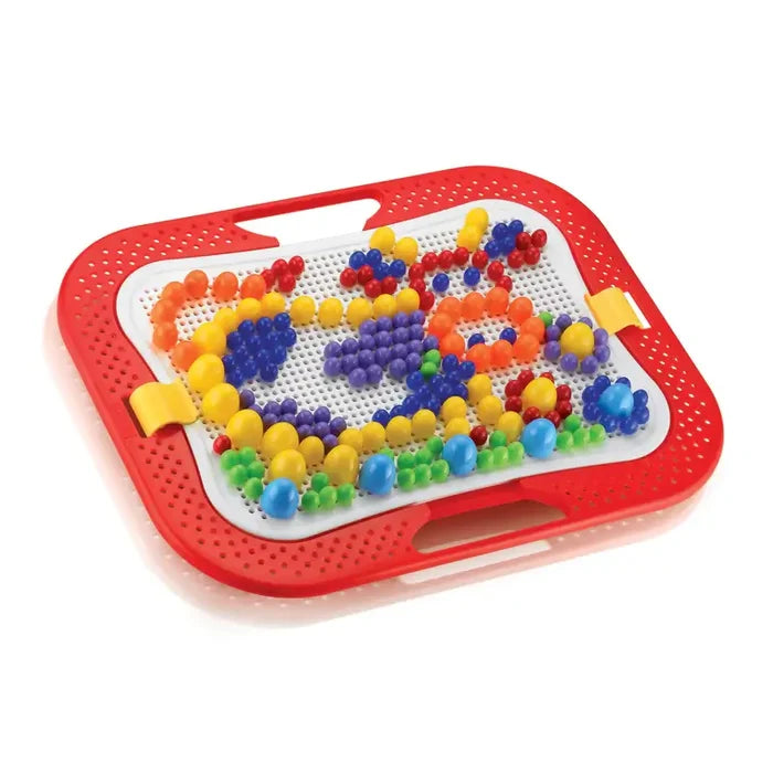 White pegboard in a red carry tray with handle, featuring colorful mushroom-shaped pegs in various sizes and patterns.