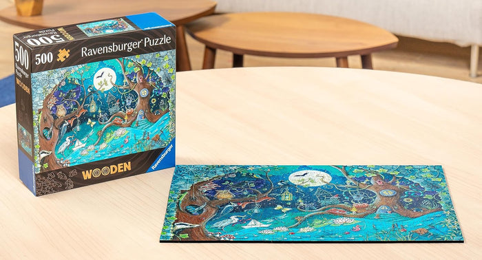 500-piece wooden puzzle and box showing a magical night forest with a full moon, owls, and lanterns in vibrant blues.
