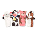 Four plush hand puppets: a white sheep, cow with a bell, pink striped pig, and brown horse against a white background.