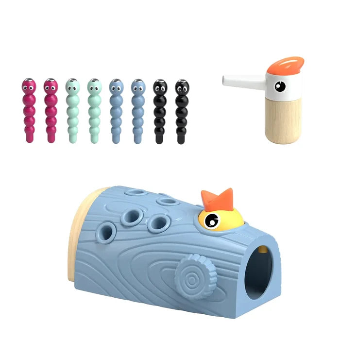 Blue log toy with a yellow bird, eight colorful magnetic worms, and a woodpecker-shaped magnetic wand.