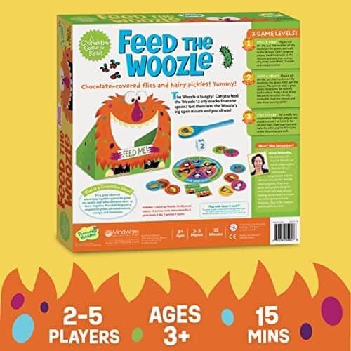 Back of a green board game box showing an orange monster, blue spoon, and spinner with player and age details.