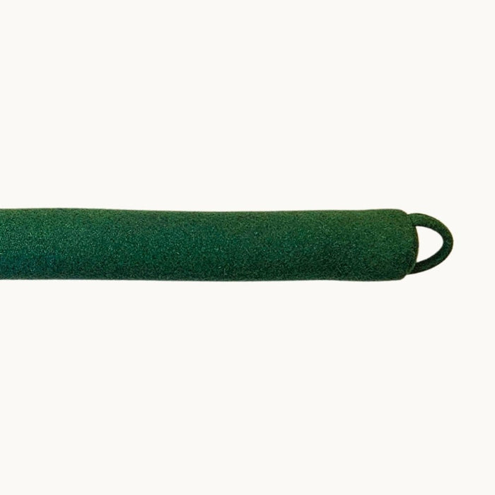 Felted New Zealand wool draught stopper by Do Not Disturb Sleep Company sealing door or window gaps for insulation.