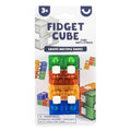 Multi-colored translucent folding block fidget toy in retail packaging with green, orange, yellow, and blue sections.