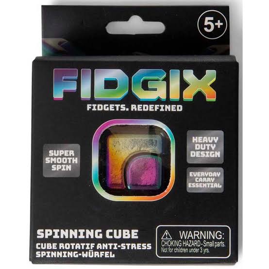 Iridescent rainbow metallic spinning cube inside black box with colorful rainbow logo and square viewing window.