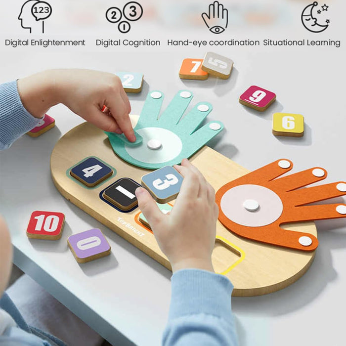 Child using a wooden counting board with teal and orange felt hands and colorful numbered wooden tiles.