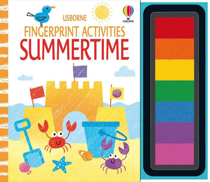 Activity book cover with a beach scene and sandcastle, next to a vertical strip of seven rainbow-colored ink pads.