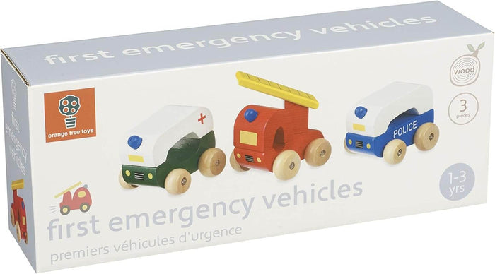 Boxed set of 3 wooden toy vehicles: green ambulance with red cross, red fire engine with ladder, and blue police car.