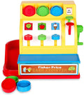 Yellow toy cash register with colorful buttons, plastic coins, a red side chute, and a side-mounted hand crank.