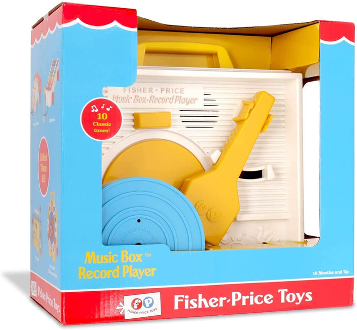 White and yellow toy record player in red and blue vintage-style packaging with a light blue plastic record.