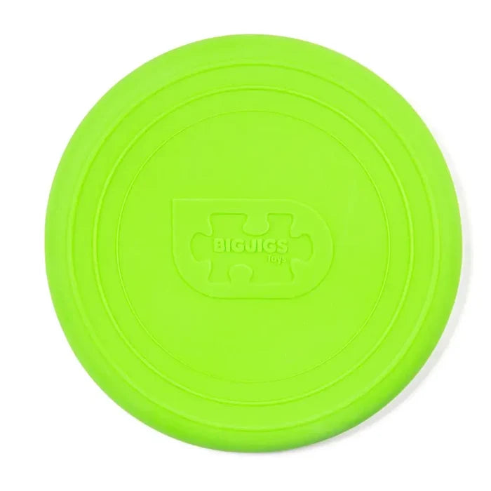 Lime green circular flying disc with concentric rings and an embossed Bigjigs Toys puzzle piece logo.