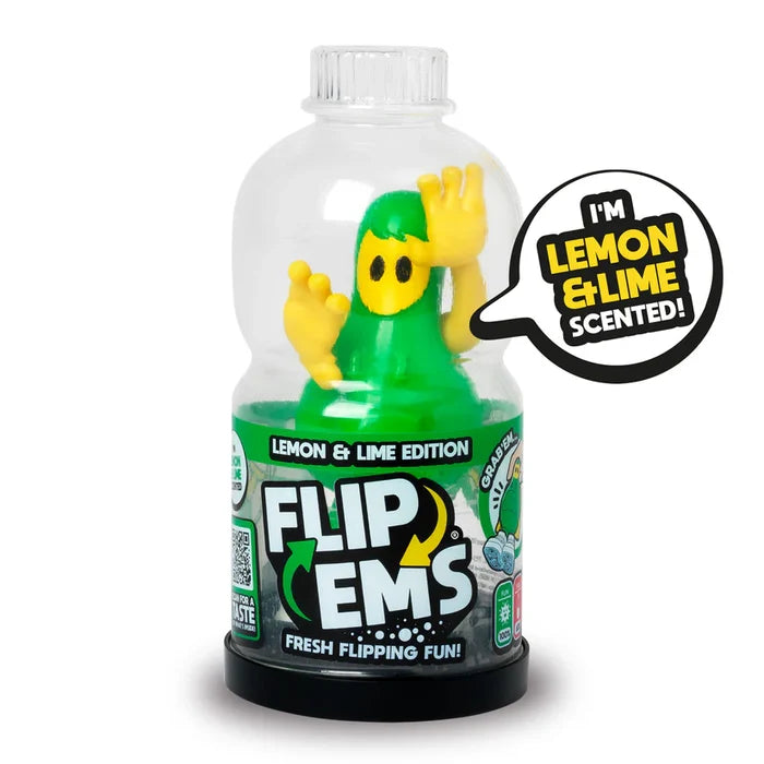 Green and yellow toy character inside a clear bottle-shaped container, labeled as lemon and lime scented.