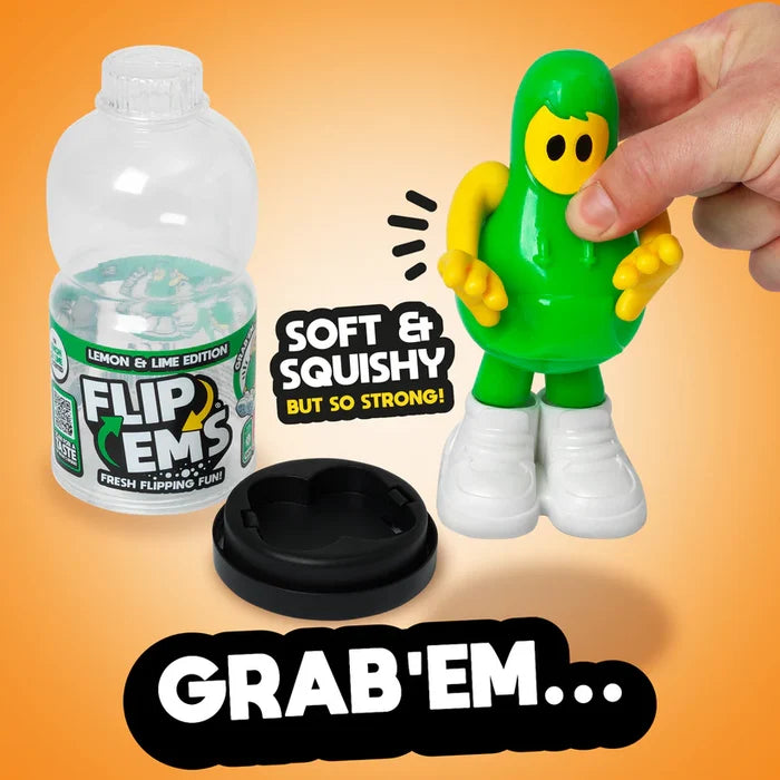 Squishy green toy figure with yellow face and white shoes next to its clear bottle packaging and black base.