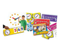 Educational kit featuring yellow clocks, sand timers, a bingo game, and colorful spiral-bound activity books.