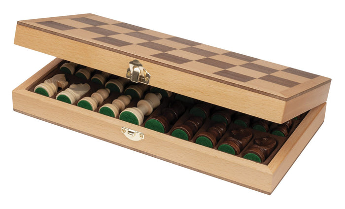 Light wood folding chess box, partially open to show carved pieces in a green felt-lined interior with a gold clasp.