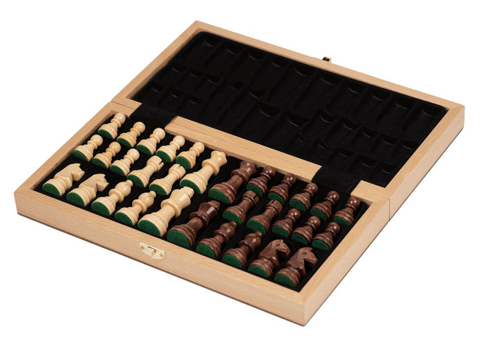 Open light wood chess box with carved light and dark pieces stored in a black felt-lined tray with green bases.
