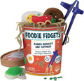 Red toy ramen cup with stretchy tan noodles, squishy food with cute faces, and blue finger chopsticks.