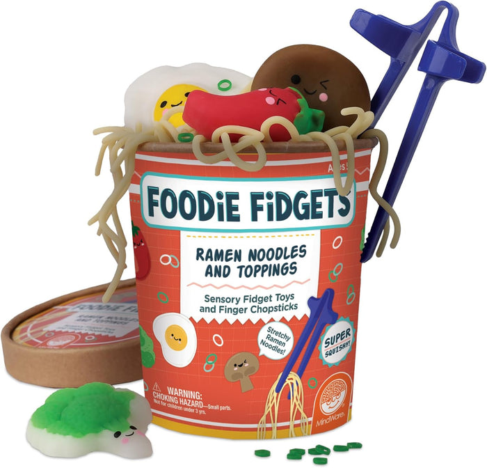 Red toy ramen cup with stretchy tan noodles, squishy food with cute faces, and blue finger chopsticks.