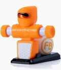 Orange robot with a black visor, white chest, and rod-like arms with gear ends, standing on a black rectangular base.