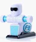 White robot toy with black visor, light blue details, and FB logo on side, standing on a black base.