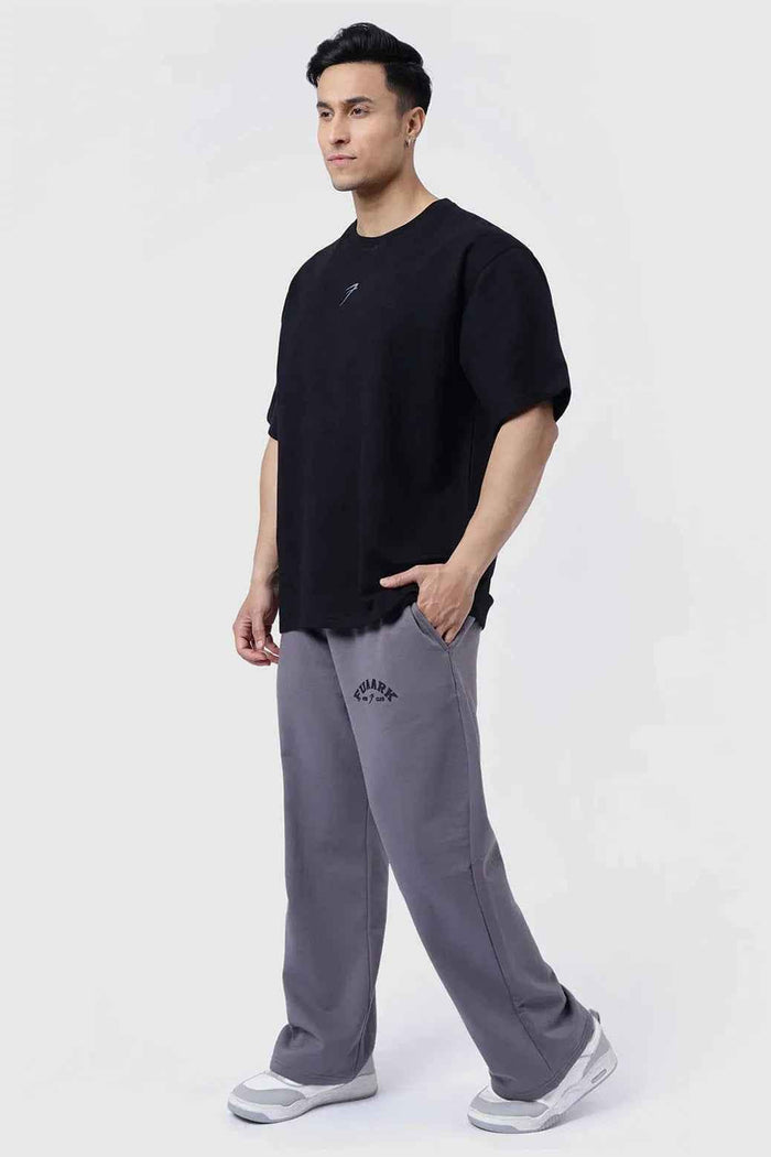 Black oversized Fortitude T-shirt by Fuaark Nz, featuring a relaxed fit and casual style, shown on a plain background.