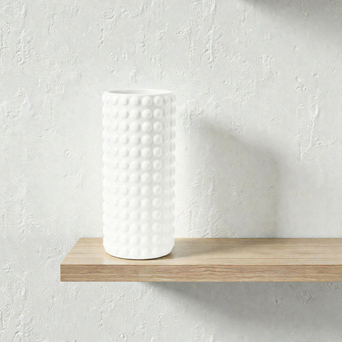 White ceramic bubble vase with glossy finish, styled with flowers, from Nest & Stem Homewares, perfect for modern home decor.