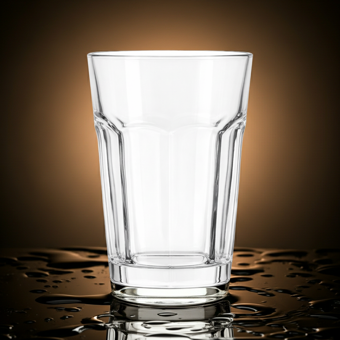 Clear faceted glass tumbler by Nest & Stem Homewares, 473ml capacity, with a stylish geometric design for elegant glassware.
