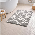 Nest & Stem Homewares Frankly Cotton Geometric Bath Mat with white and gray pattern on soft cotton surface.