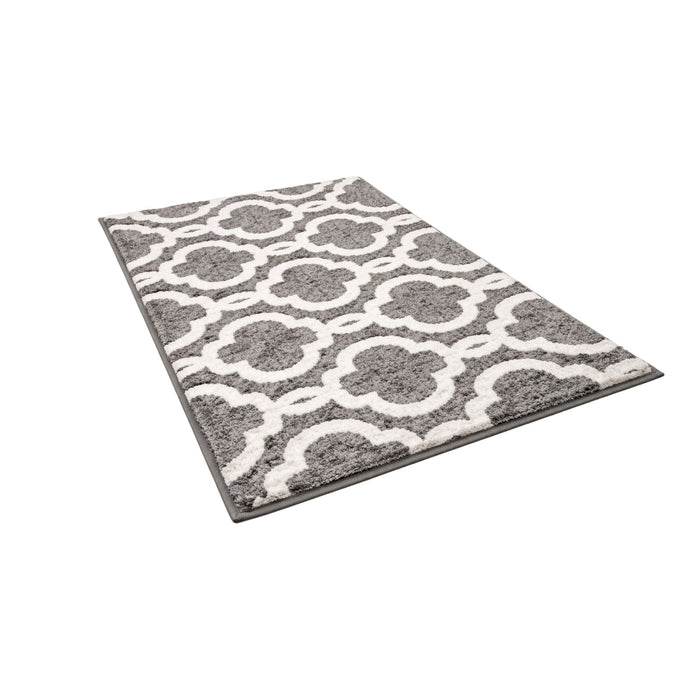 Gray Frankly Cotton Geometric Bath Mat by Nest & Stem Homewares showing a soft, textured cotton bath mat with geometric pattern.