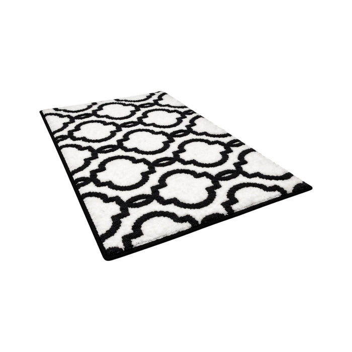 White geometric cotton bath mat from Nest & Stem Homewares, featuring a soft, absorbent design for bathroom decor.