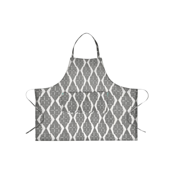 Patterned cotton apron from Nest & Stem Homewares featuring a colorful Frankly Cotton design, ideal for cooking or baking.