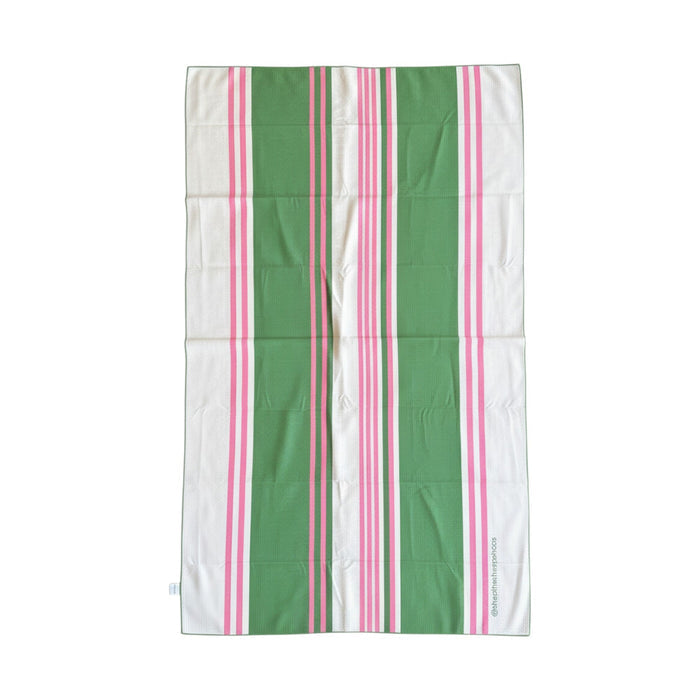 Nest & Stem Homewares cotton quick-dry beach towel in white, green, and pink, measuring 100x180cm, sandless and lightweight.