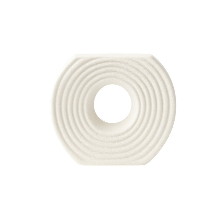 White circular ceramic vase with textured surface by Nest & Stem Homewares, displayed against a white background.