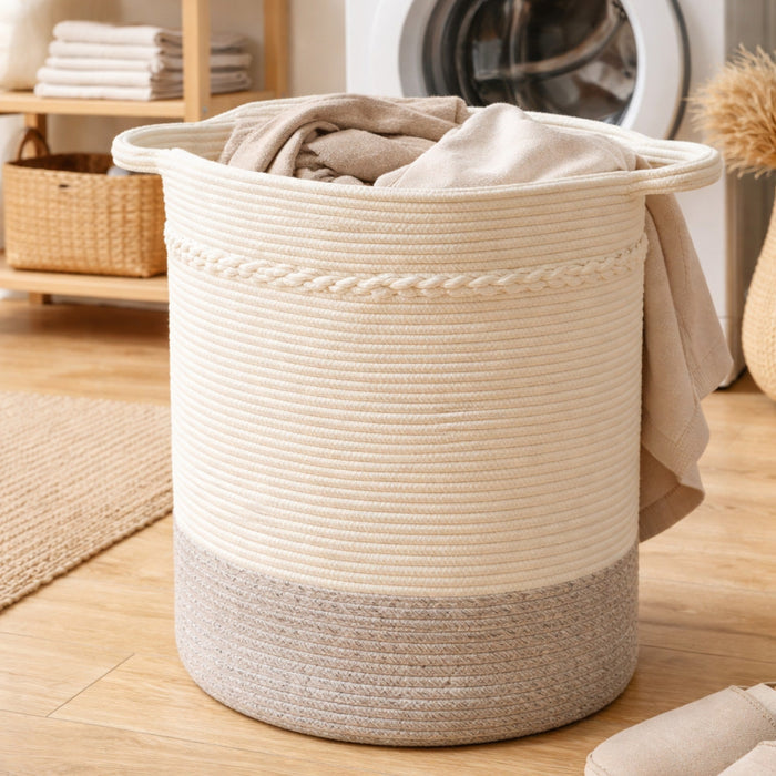 White and natural woven linen laundry basket by Nest & Stem Homewares with a sturdy handle and spacious interior.