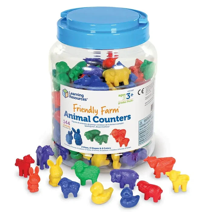 Clear plastic jar with blue lid filled with colorful toy farm animals; several figures are scattered in the foreground.