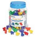 Clear plastic jar with blue lid filled with colorful toy farm animals; several figures are scattered in the foreground.
