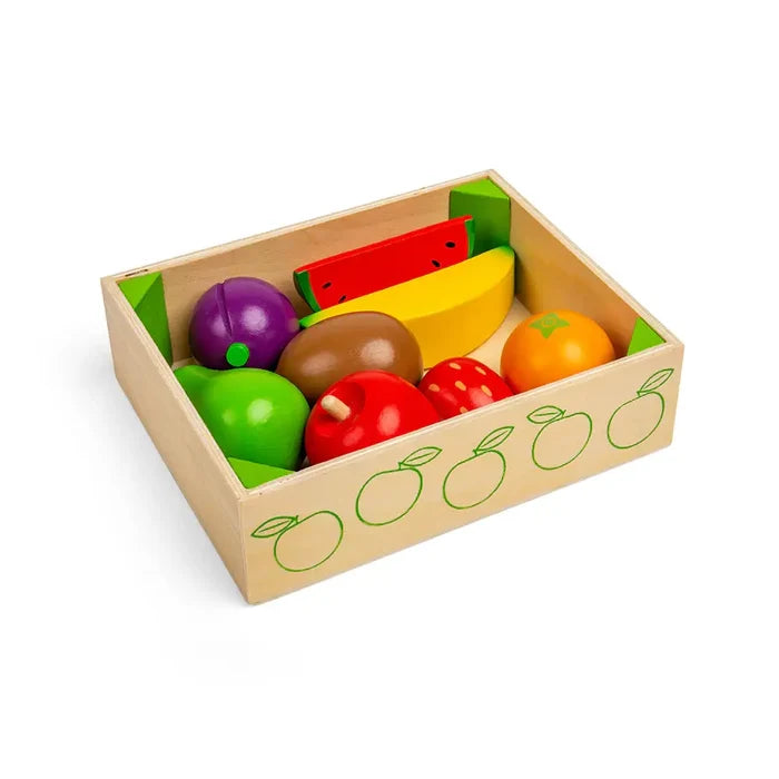 Wooden crate filled with colorful play fruit including a red apple, yellow banana, strawberry, and watermelon slice.