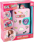 Pink secret journal toy with a heart-shaped lock and stickers in packaging showing hidden compartments.