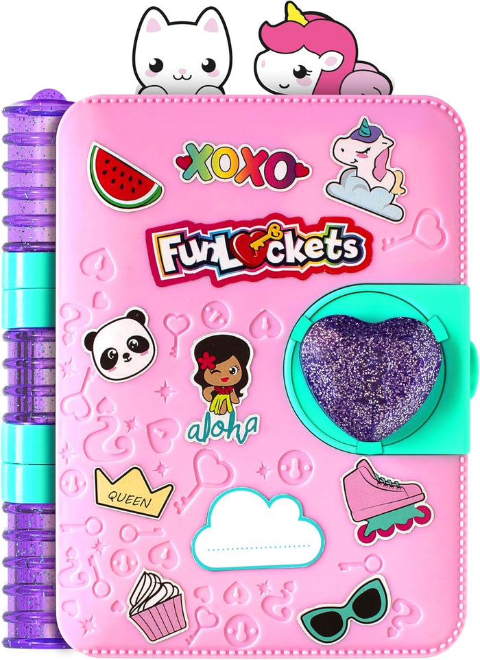 Pink journal with colorful stickers, a large purple glitter heart lock, and cat and unicorn figurines on top.