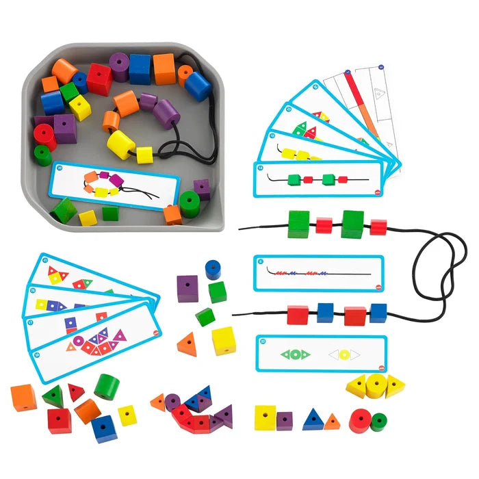 Vibrant geometric beads, black threading laces, and pattern cards for kids, shown with a grey storage tray.