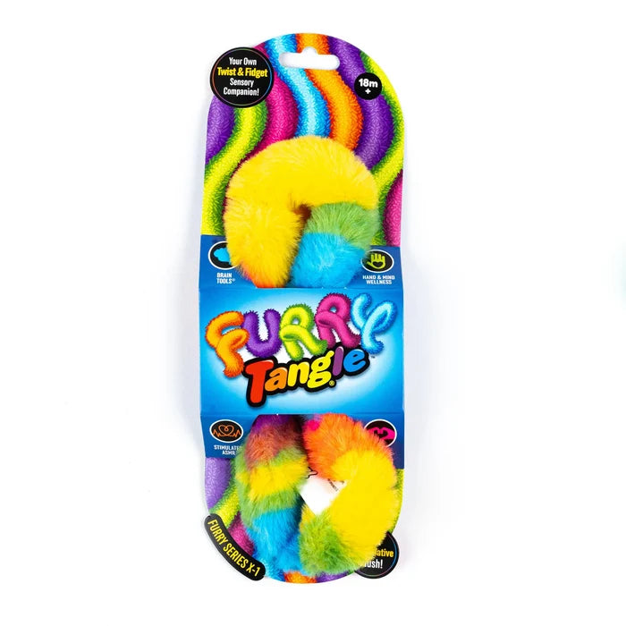 Colorful fuzzy rainbow fidget toy with a plush texture, twisted around its blue and purple packaging.