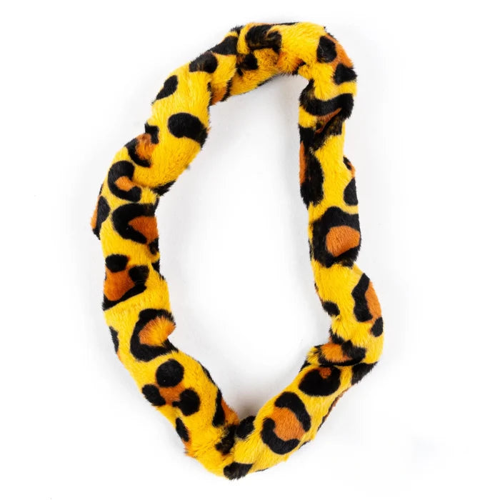 Furry leopard print loop with yellow, black, and orange spots, twisted into an oval shape on a white background.