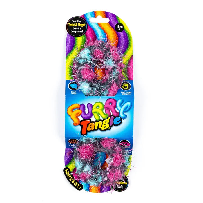 Pink, teal, and grey fuzzy sensory ring on a vibrant rainbow-patterned cardboard retail display package.