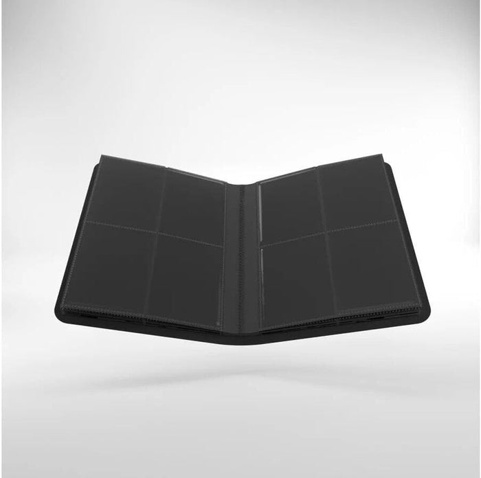 Open black 8-pocket trading card binder with clear plastic sleeves, shown against a light grey background.